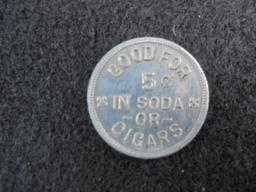 OLD TRADE TOKEN FROM LAUREL NEBRASKA-"CIGAR OR SODA"