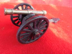 OLDER CAST IRON CANNON WITH BRASS BARREL