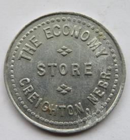 "THE ECONOMY STORE - CREIGHTON, NEBRASKA" - 25 CENT TRADE TOKEN