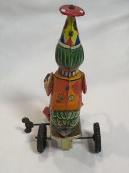 WIND-UP BIRD ON TRICYCLE