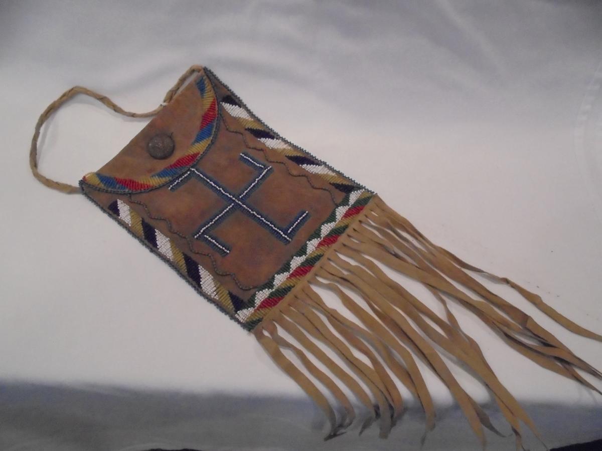 BEADED BAG WITH "US INDIAN SERVICE" BRASS BUTTON-16 INCHES WITH LEATHER STRIPS