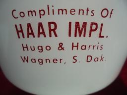 OLD WHITE GLASS BOWL WITH ADVERTISING FROM "HAAR IMPLEMENT" OF WAGNER SOUTH DAKOTA