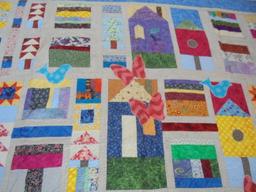 OLD MULTI-COLORED WITH NEAT DESIGNS QUILT-LOOKS LIKE SOME HAND STICHING