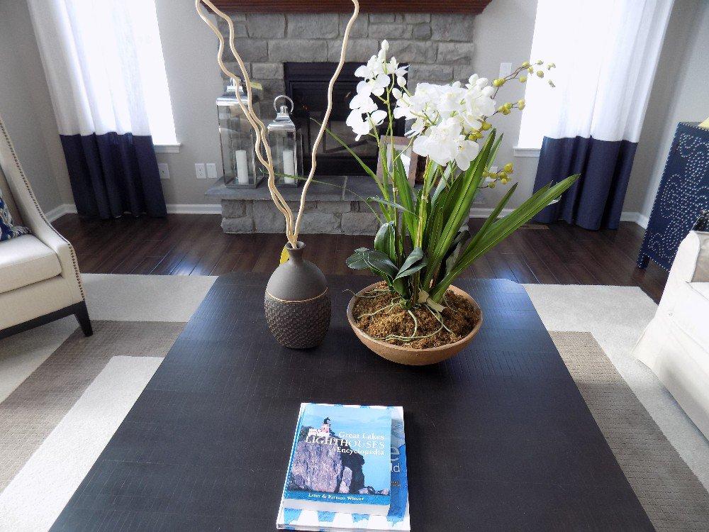 Center piece, vase, and books