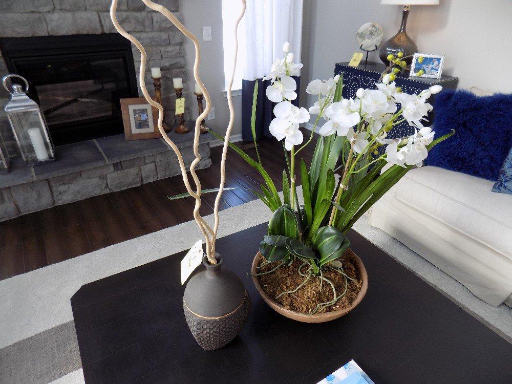 Center piece, vase, and books