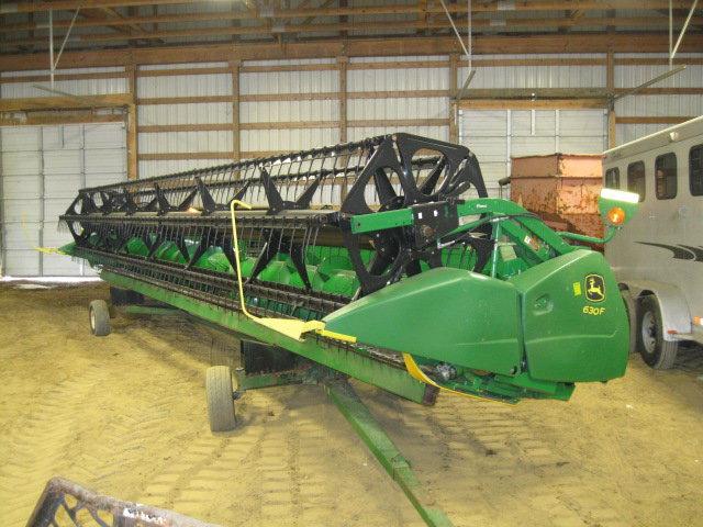 2013 JOHN DEERE 630F W/ EZ TRAIL HEADER CART