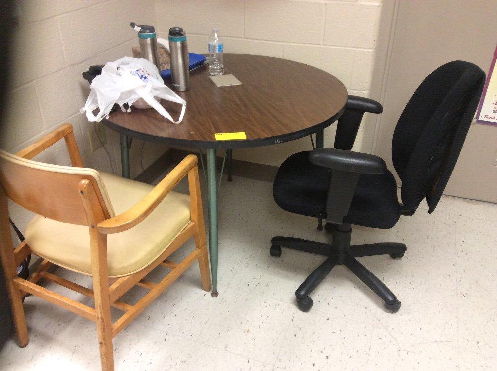 Small table and two chairs and a metal file cabinet