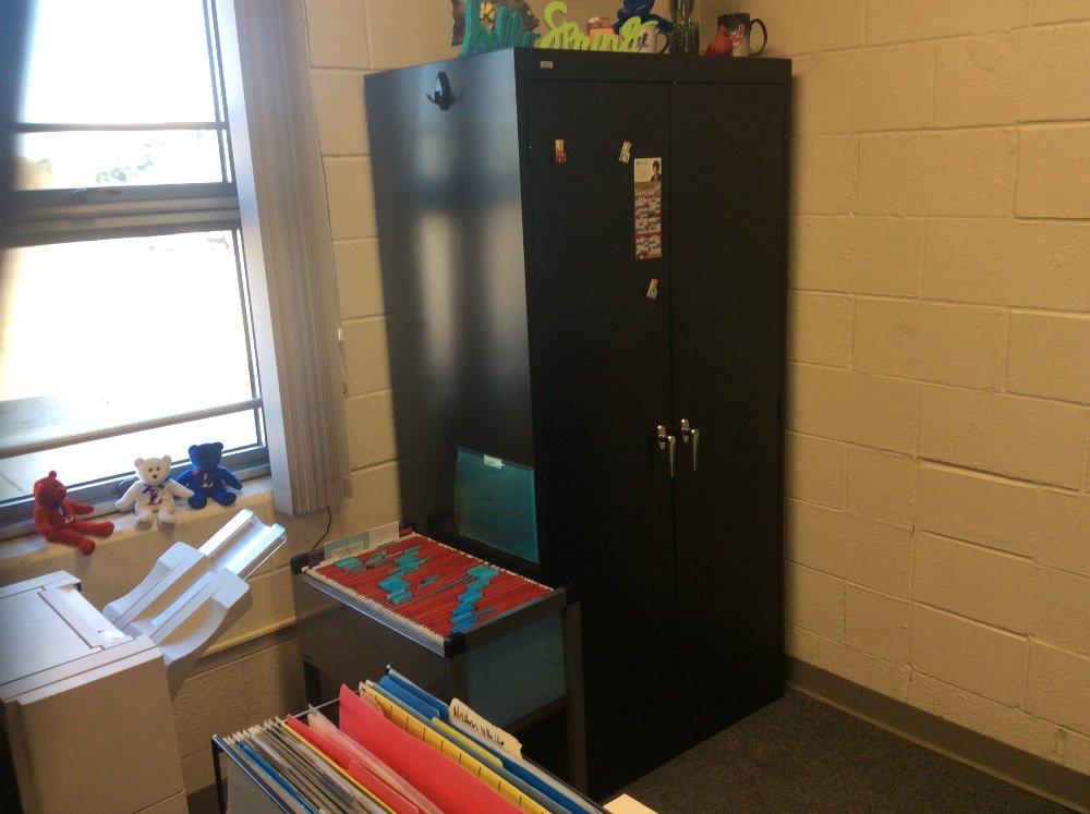 Corner desk and metal filing cabinet. Contents not included