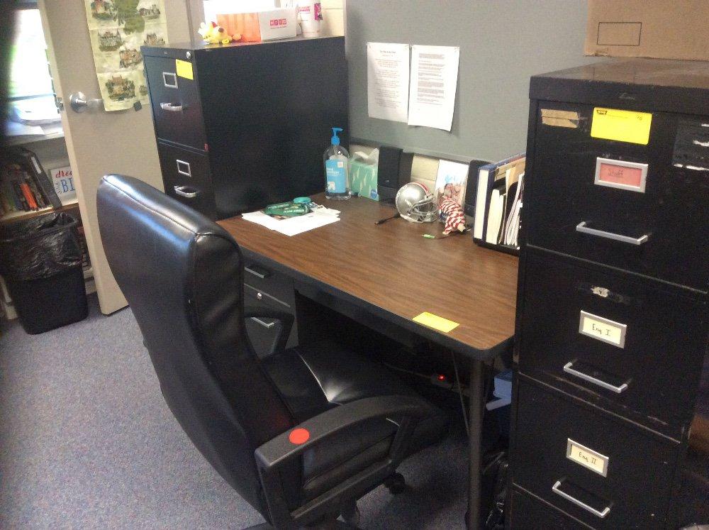 Read metal desk, one student table, three file cabinets, chair. Contents not included