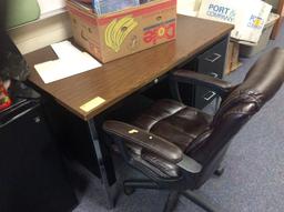 Read metal desk, one student table, three file cabinets, chair. Contents not included