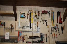 Contents of peg board incl.: hand tools & bolt stock