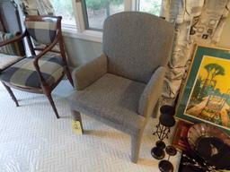 Grey upholstered arm chair