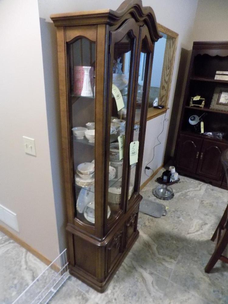 Four-door curio cabinet, lighted with keys