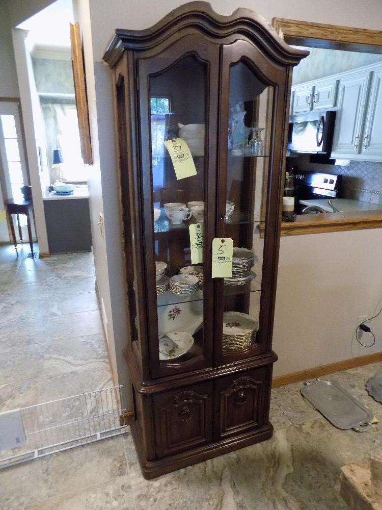 Four-door curio cabinet, lighted with keys