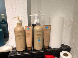 Assorted Used Shampoos and Conditioners