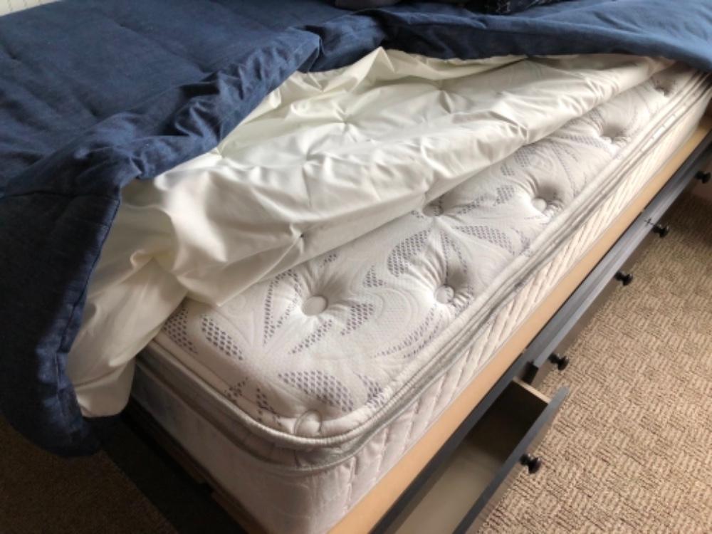 Bed with pocket storage