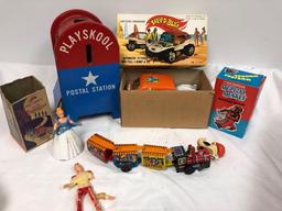 Tin toy train, musical monkey, speed bag battery operated, and other vintage toys