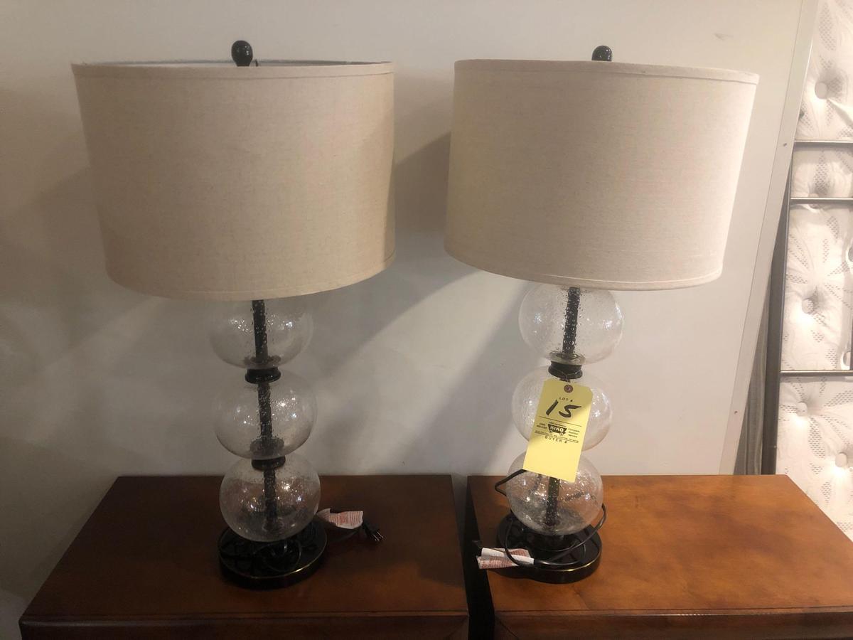 2 glass lamps with oatmeal shades