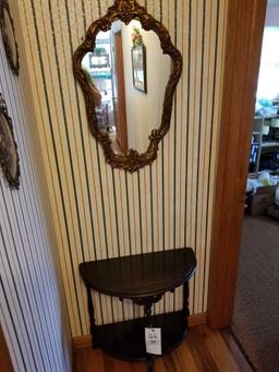 Wall table and gold framed mirror