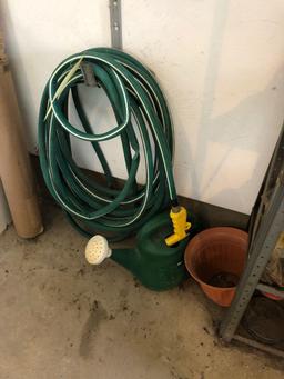 Shelf, contents and garden hose