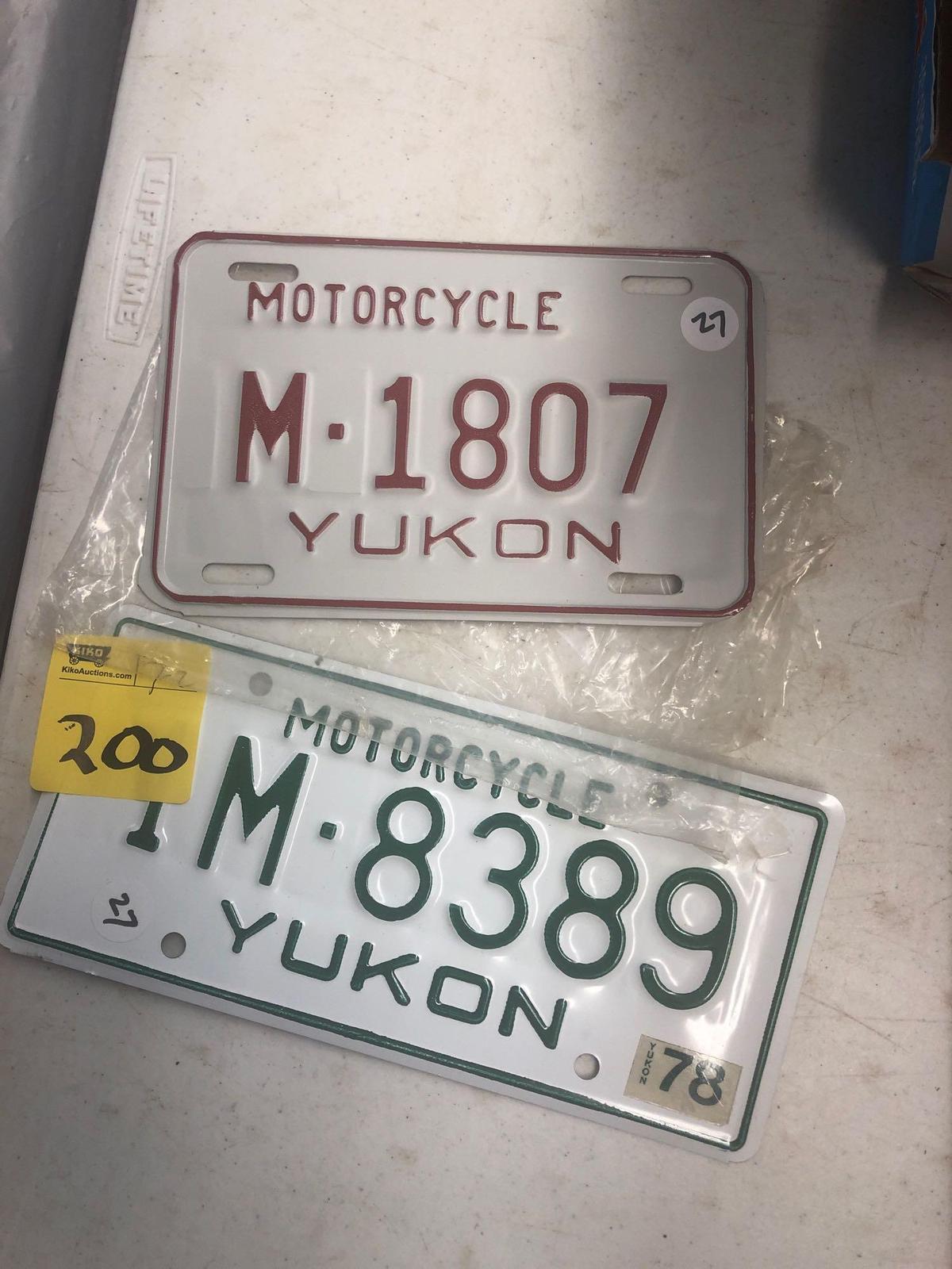 Two motorcycle Yukon license plates 1978