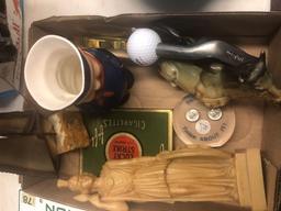 Box of collectibles, Napco mug, golf club magnifying glass, Queens piggy bank, cigarette advertising