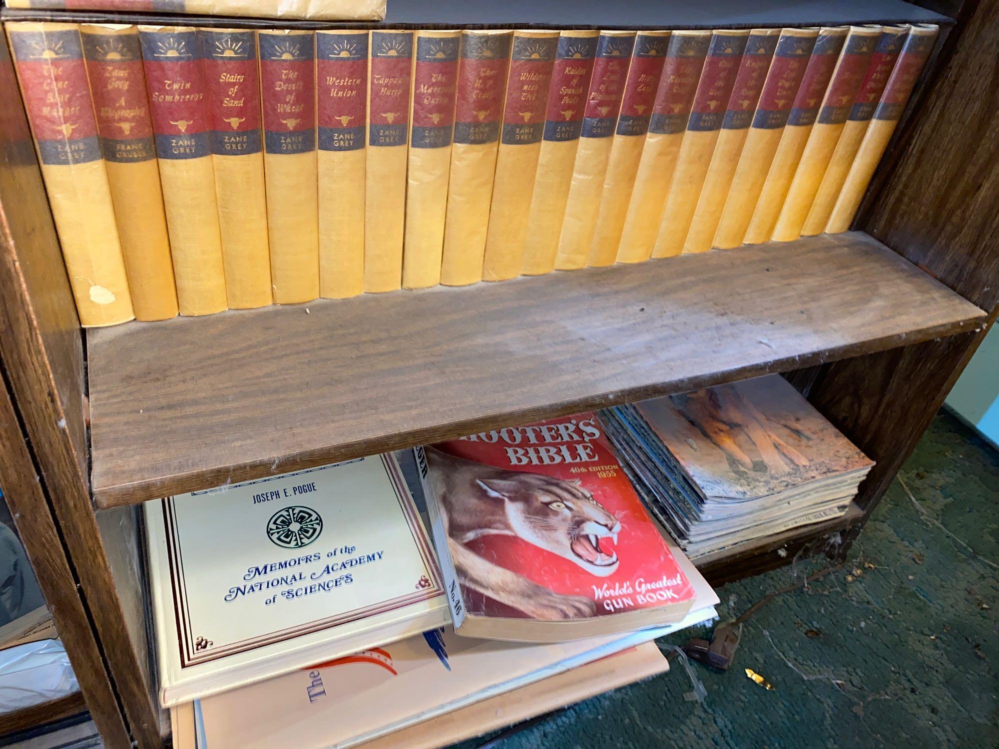 Four bookcases with contents