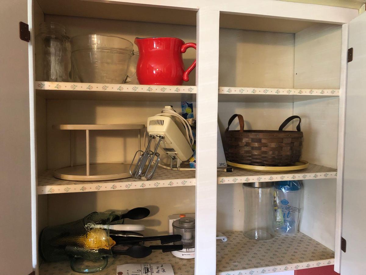 Kitchen household, cast-iron skillet, baskets tins and canisters.