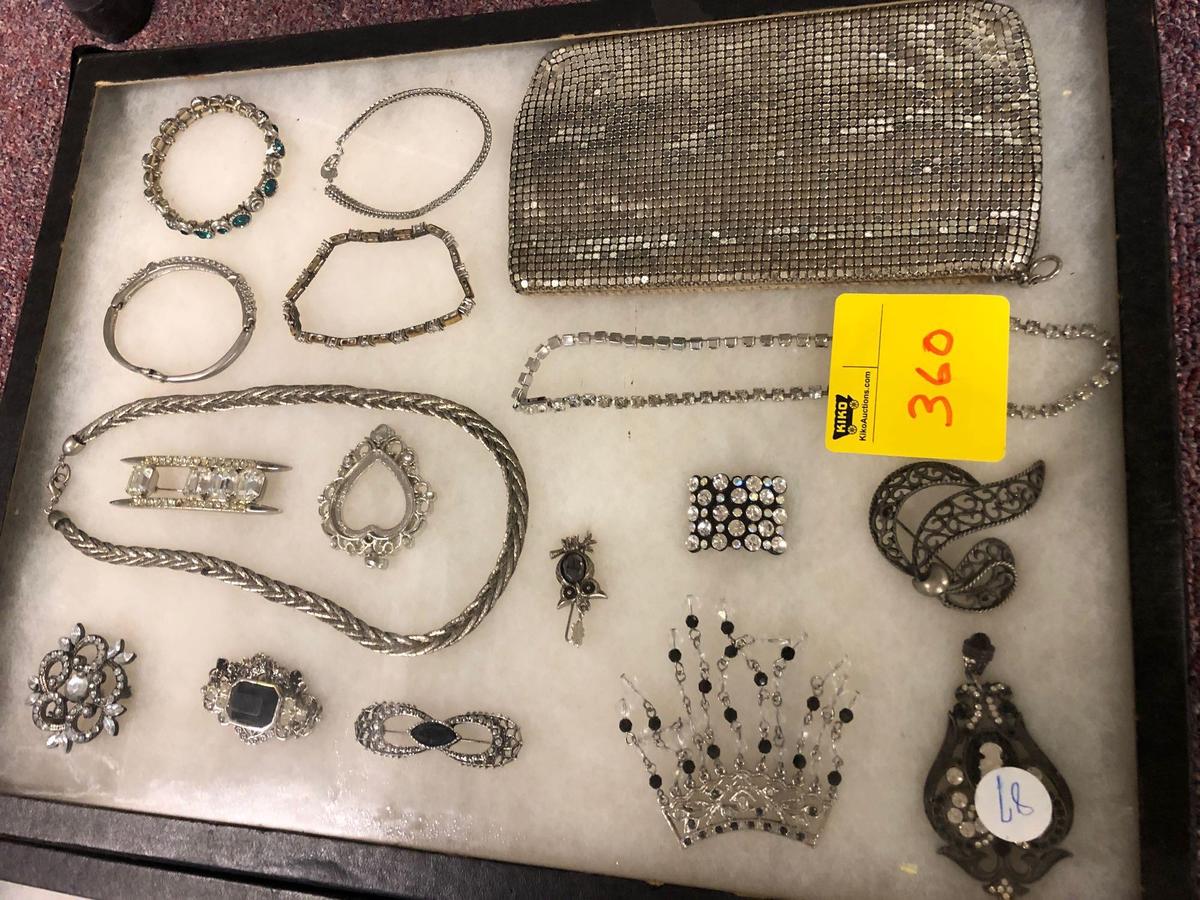 Three showcases of jewelry And one flat of jewelry, cases not included