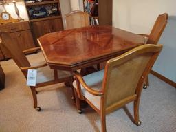 Oak Table w/ 4 Rolling Cane Back Chairs