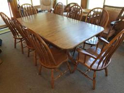 Solid oak table with 8 chairs
