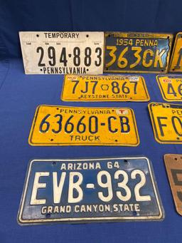 Assorted 1950s & '60s license plates and temporary paper tags