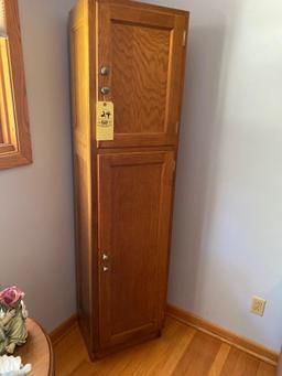 2-Door storage cabinet, 72" tall x 18" wide.