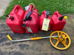 4 Gas Cans and Measure Meter