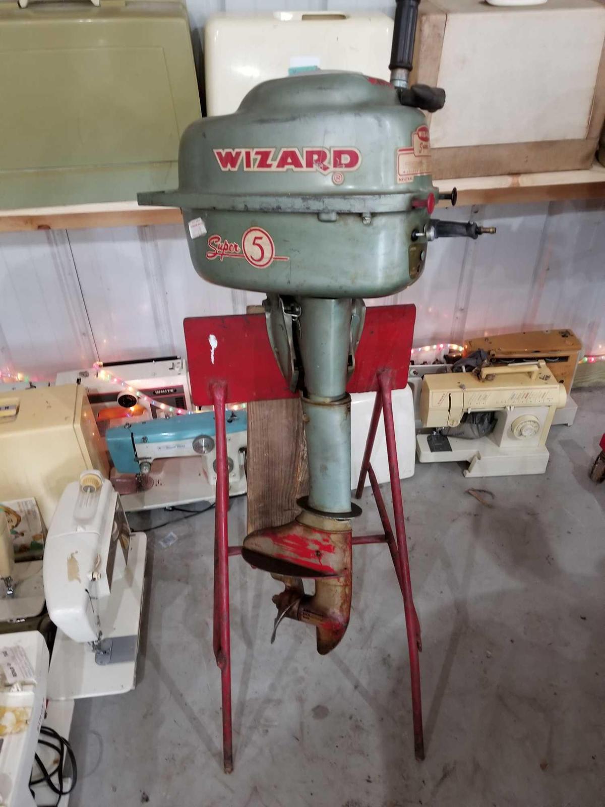 Wizard super 5 boat motor and stand