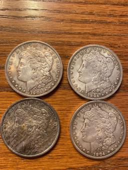 (4) Silver dollars (1900-O, three 1904-0). Bid times number.