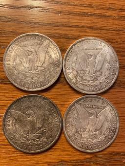 (4) Silver dollars (1900-O, three 1904-0). Bid times number.