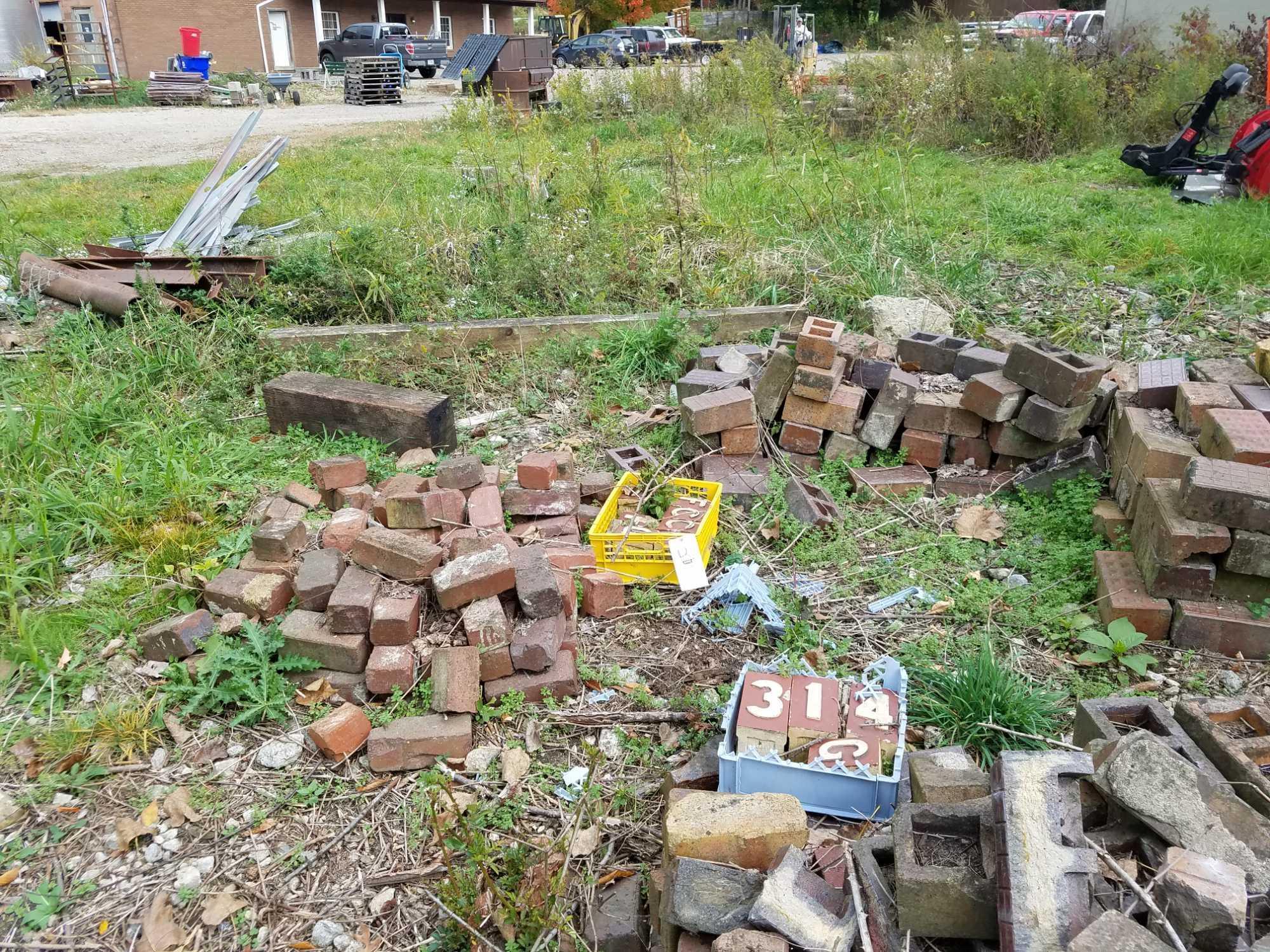 Group of assorted paving brick. Some from Ohio State Prison