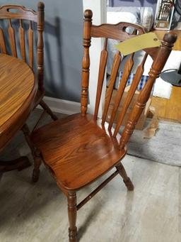 Tell city oak table with formica top, 2 extra leaves and 6 oak chairs