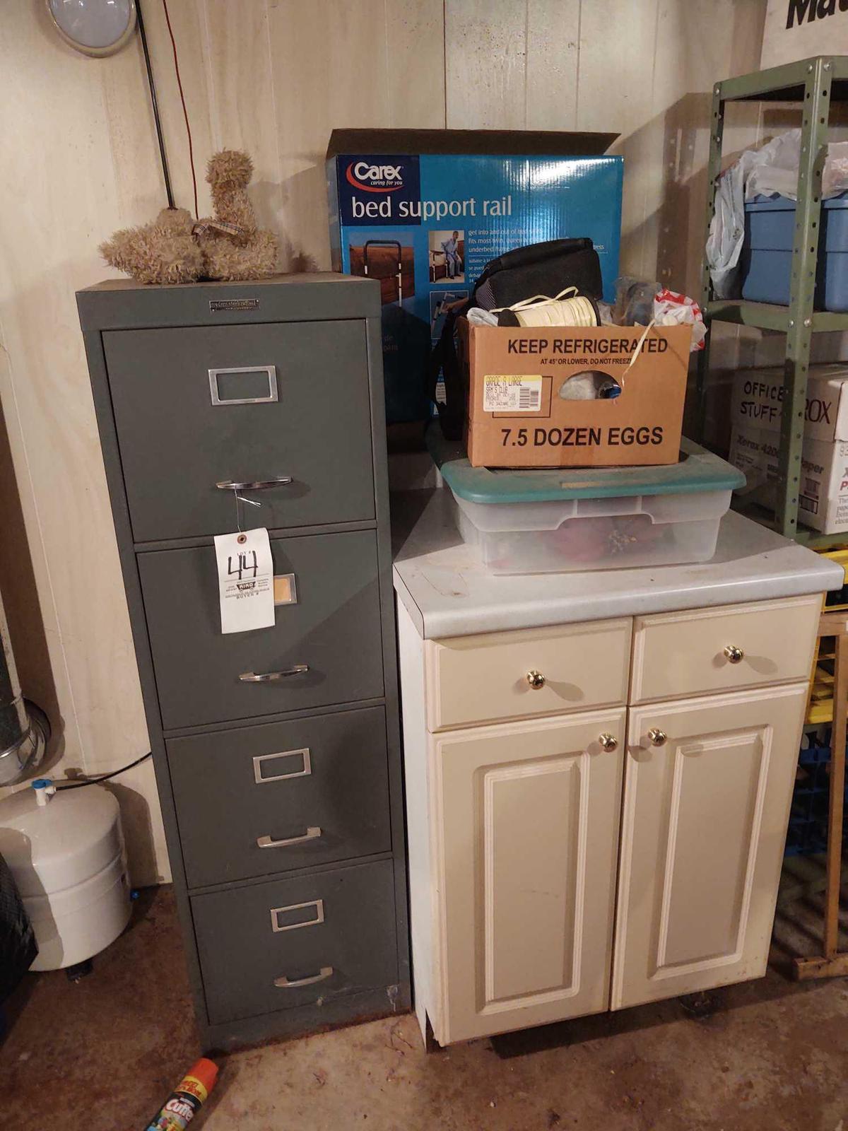 Four-drawer filing cabinet and cabinet with contents