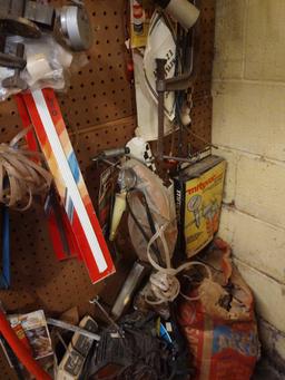 Contents of Peg Board: grinder, paint sprayer, pipe wrenches, C clamps, hand tools & Model Airplane