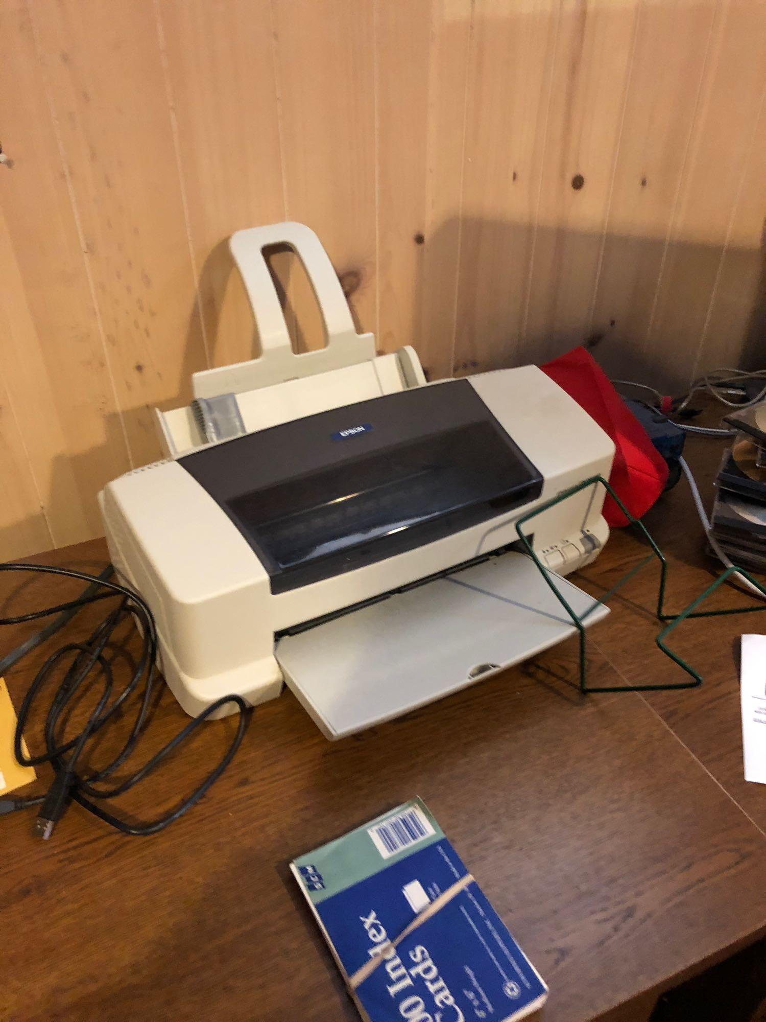 Apple computer, desk items and printer