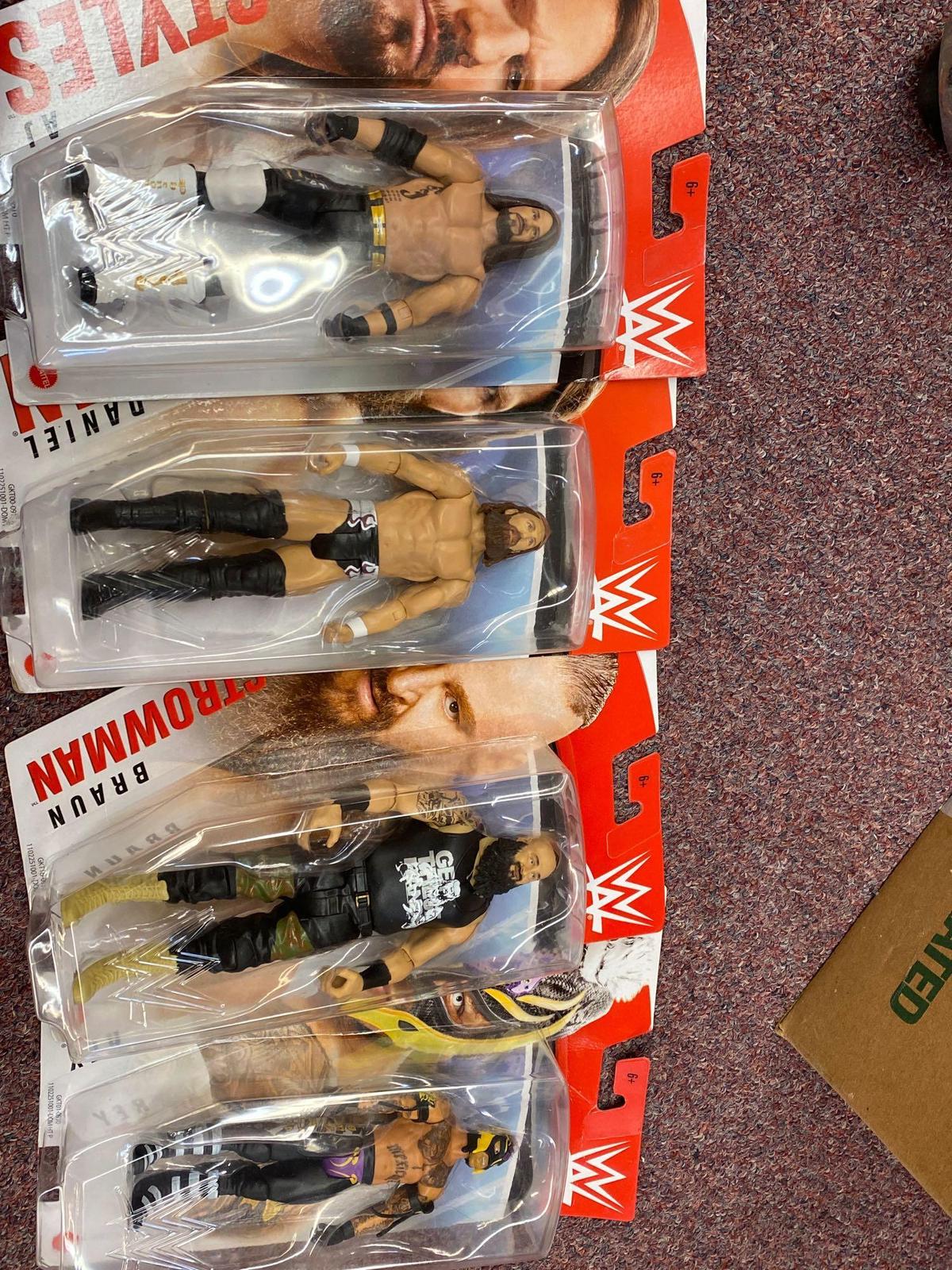 4 wrestling figures