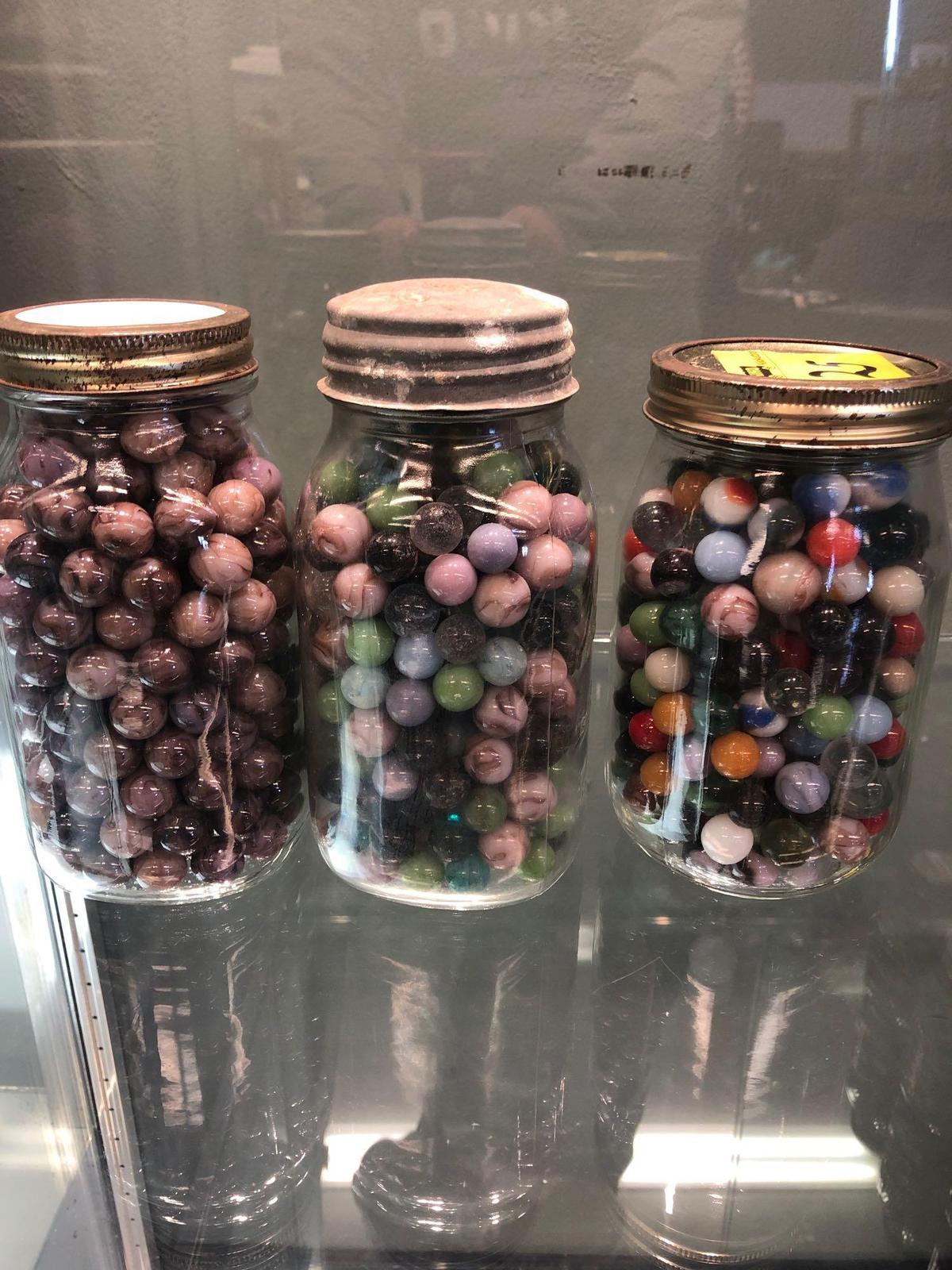 3 jars vintage marbles