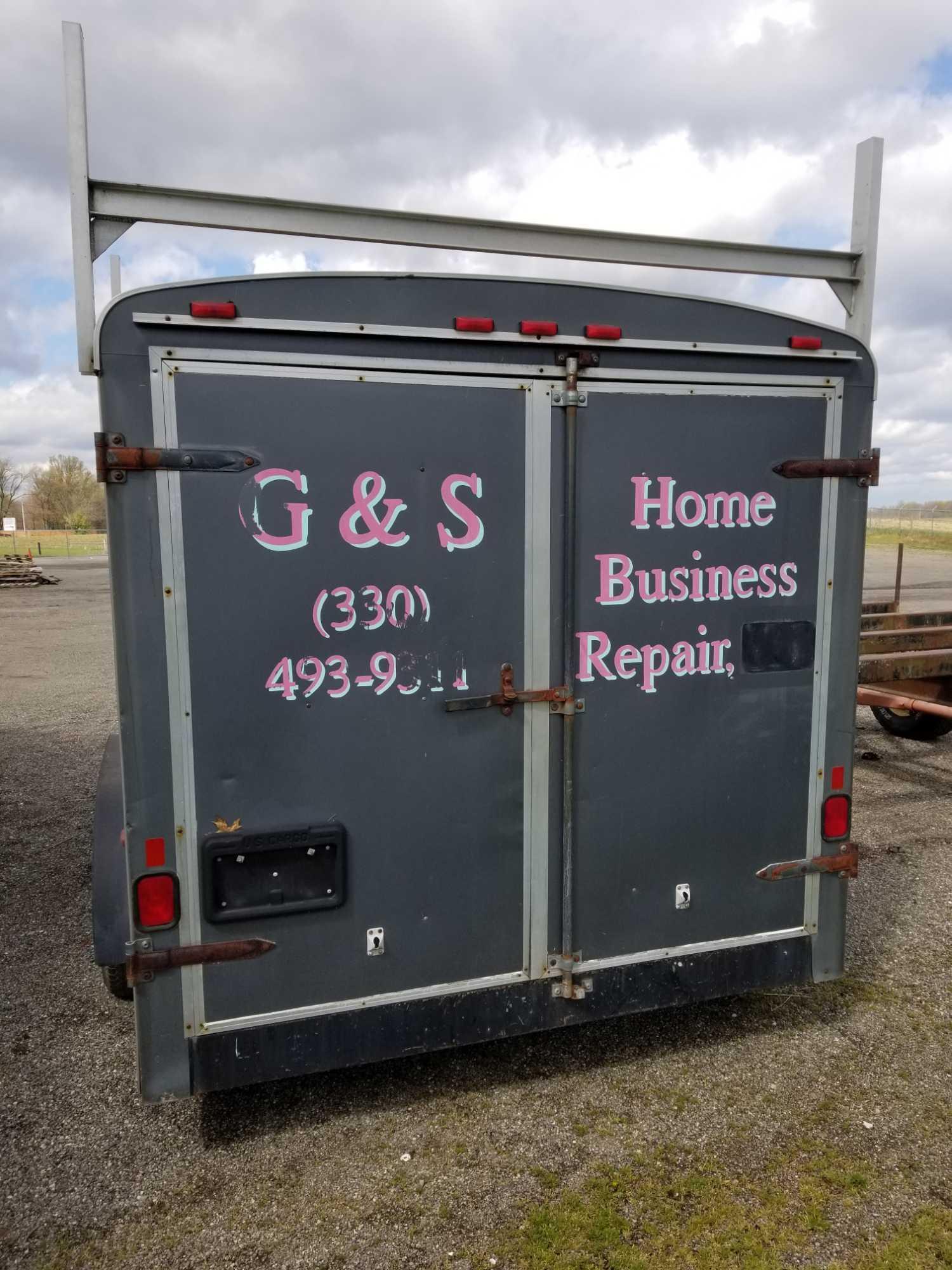 1999 US cargo box trailer, 14 ft., rear barn doors, ladder rack and spare tire