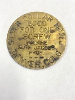 Vintage brothel token, Denver, Silver Dollar Hotel