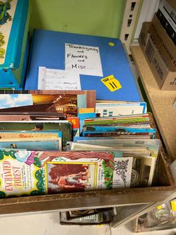 Wooden box with vintage postcards, old postcards some as old as 1900s