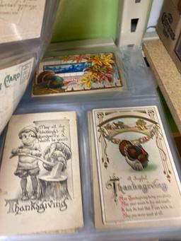 Wooden box with vintage postcards, old postcards some as old as 1900s