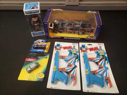 Batman toys (Batmobile, Batplane launcher, Wacky Wobbler)