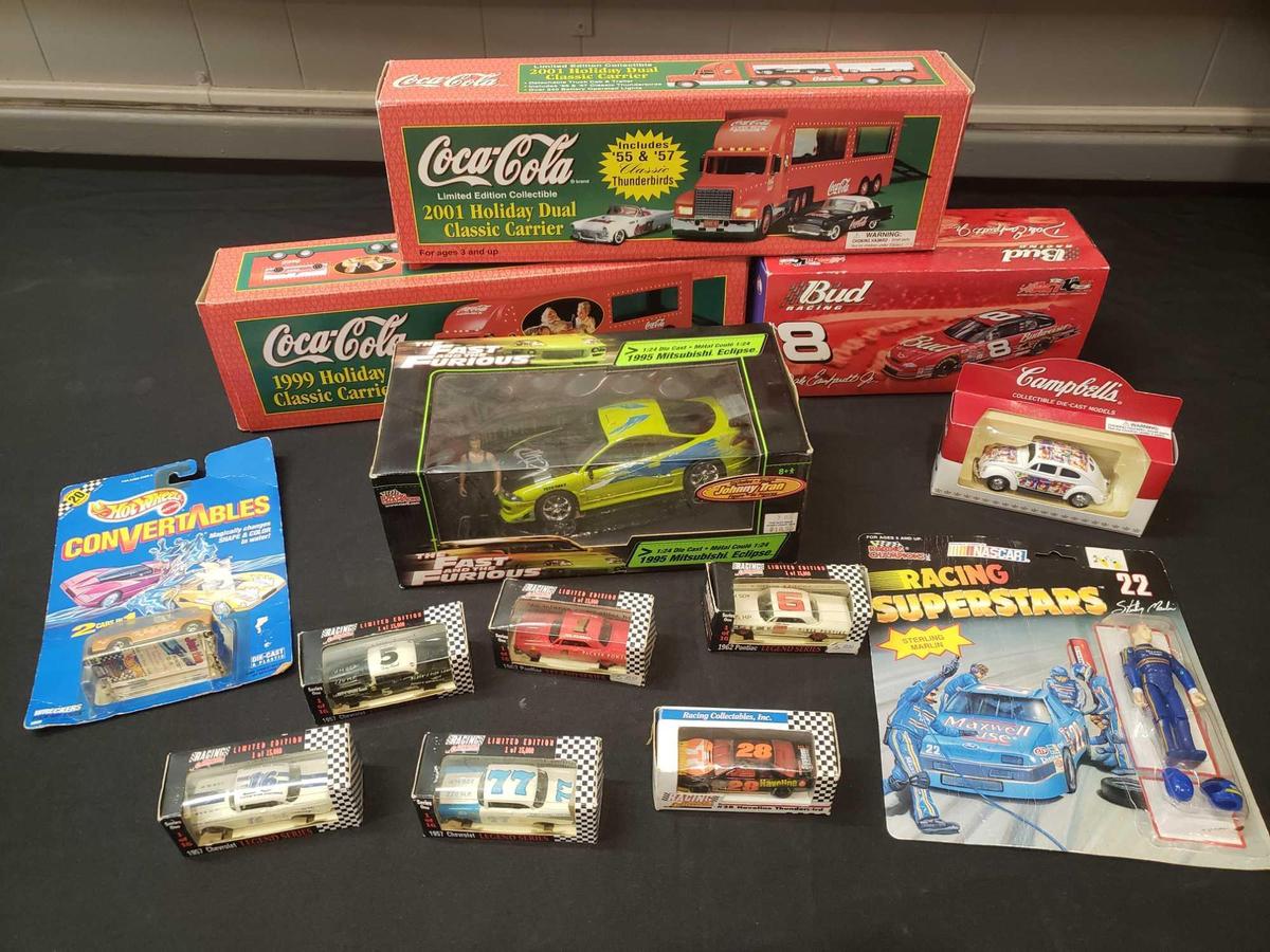 Diecast lot including Coca-Cola trucks, Budweiser NASCAR